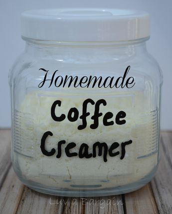 homemade coffee creamer in a glass jar on a wooden table with the words homemade