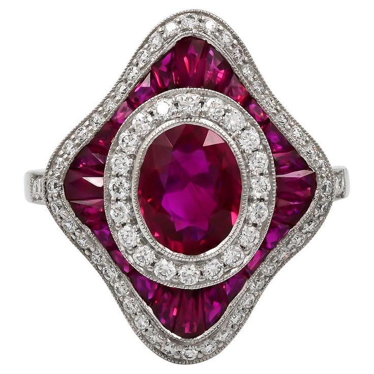 Sophia D Art Deco platinum ring. The center ruby stone is 1.29 carats accented with .48 carats of diamonds and .95 carats of rubies. Size is 6 and available for resizing. Sophia D by Joseph Dardashti LTD has been known worldwide for 35 years and are inspired by classic Art Deco design that merges with modern manufacturing techniques. Art Deco Diamond Rings, Ruby Stone, Deco Ring, Platinum Ring, Ruby Diamond, Art Deco Ring, Art Deco Design, Diamond Art, Classic Art