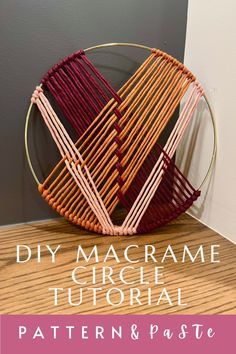 a circular basket sitting on top of a wooden floor next to a white wall with the words diy macrame circle