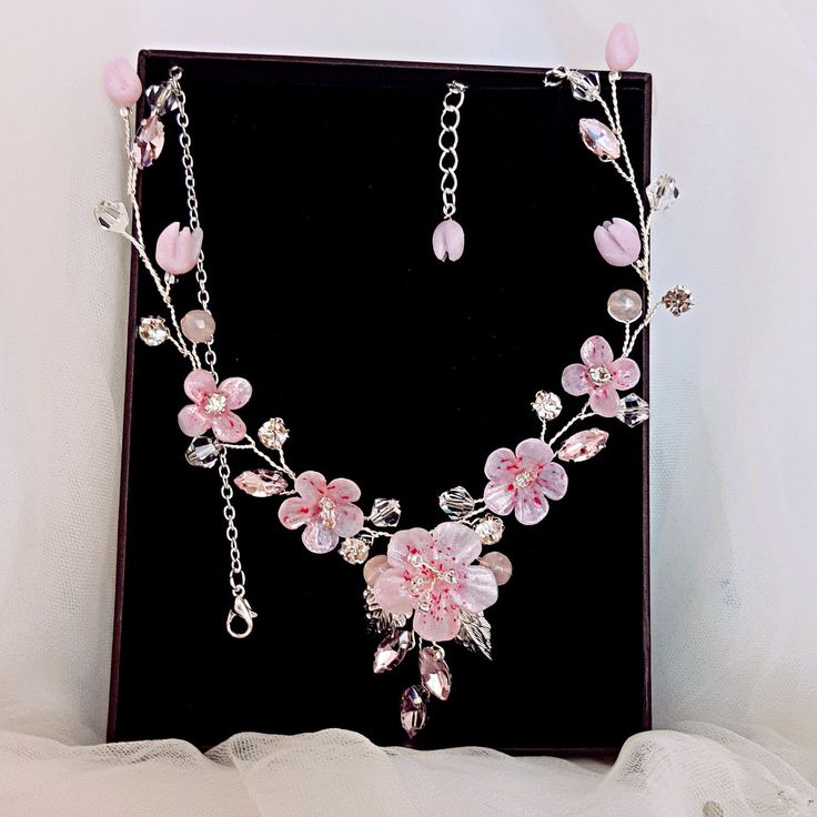 Bridal floral necklace for wedding. Cherry blossom necklace silver, gold or rose gold color. Pink sakura bridal necklace.  Blush flower wedding jewelry for bride, bridesmaids or mom. Blossom wedding necklace for bridal. Please refer to the precise dimensions provided below, as the photos may not accurately represent the size of the actual accessories. More items from my shop: https://www.etsy.com/shop/JewelryforbridesShop?ref=seller-platform-mcnav Total length of the necklace: 42cm (16.5 inches) Delicate Rose Gold Jewelry With Flower Decoration, Delicate Silver Jewelry With Flower Decoration, Rose Gold Party Jewelry With Flower Decoration, Elegant Silver Flower Necklace With Decoration, Elegant Flower Shaped Wedding Jewelry, Silver Party Jewelry With Flower Decoration, Silver Jewelry With Flower Decoration For Party, Elegant Flower-shaped Wedding Jewelry, Rose Gold Jewelry With Flower Decoration For Party