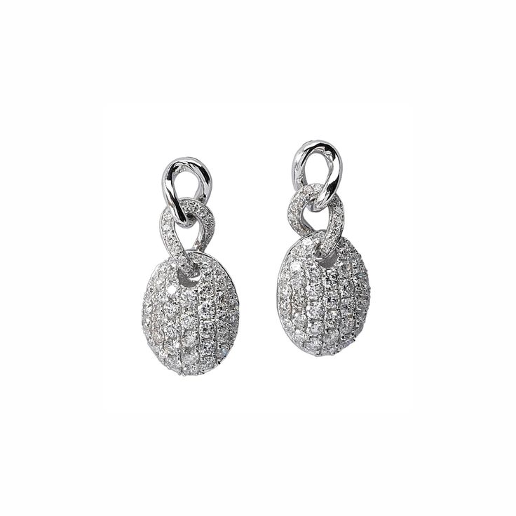 These oval drops are adorned with our cubic zirconia for a modern twist on classic elegance. A slight turn of the head will catch any light and provide the perfect amount of shimmer and ultimate style. Details: Metal: Rhodium-Plated on Sterling Silver Base Stones: AAAAA-Grade Cubic Zirconia Height: 19.4 mm Width: 8.70 mm Depth: 4.99 mm Oval Diamond Earrings For Evening, Oval Diamond Earrings With Accents For Evening, Oval Earrings With Pave Setting For Wedding, Oval Earrings With Pave Setting, Oval Wedding Earrings With Pave Setting, Oval Diamond Earrings In Pave Setting, Elegant Oval Earrings With Pave Setting, Oval Diamond Earrings With Pave Setting In White Gold, Oval Earrings With Diamond Accents For Evening