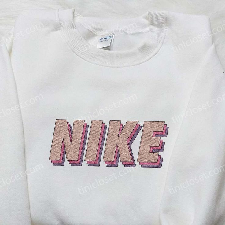 Retro x Nike Embroidered Sweatshirt, Nike Inspired Embroidered Shirt, Best Gift for Family Welcome to Tinicloset, the ultimate destination for retro-inspired custom embroidered apparel that combines the timeless charm of the past with the iconic Nike brand. We are thrilled to present our exquisite collection of clothing, featuring the stunning Retro x Nike embroidered sweatshirt, along with a variety of Nike-inspired embroidered shirts, t-shirts, and hoodies. Our clothing store is a treasure tro White Sweatshirt With Custom Embroidery, Relaxed Fit, White Sweatshirt With Custom Embroidery In Relaxed Fit, White Cotton Sweatshirt With Custom Embroidery, Long Sleeve Tops With Machine Embroidery For Streetwear, Long Sleeve Tops With Multicolor Embroidery And Letter Print, Multicolor Embroidered Long Sleeve Top With Letter Print, Multicolor Embroidery Long Sleeve Top With Letter Print, White Long Sleeve Top With Custom Embroidery, White Sporty T-shirt With Custom Embroidery