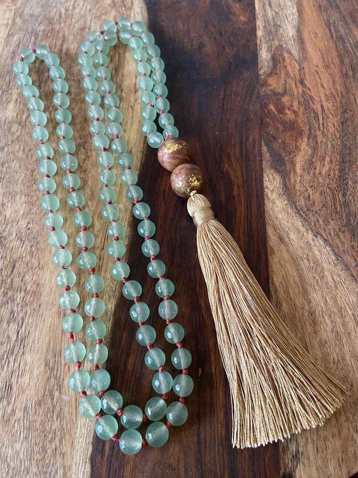 Long beaded Tassel necklace Hand knotted Necklace Mala | Etsy Gold Mala With 108 Beads For Healing, Gold Healing Mala With 108 Beads, Adjustable Spiritual Tassel Necklaces, Spiritual Tassel Necklaces With Adjustable Fit, Adjustable Spiritual Tassel Necklace For Festivals, Spiritual Tassel Necklace With 108 Round Beads, Gold Bohemian Mala As Gift, Bohemian Hand-strung Adjustable Mala, Bohemian Adjustable Hand-strung Mala