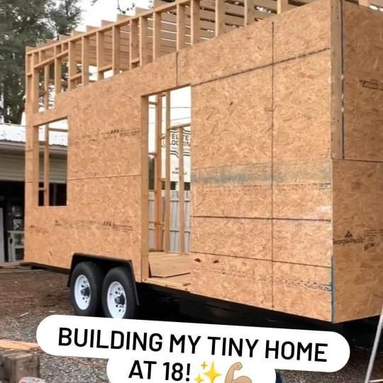 a tiny house being built on the back of a trailer