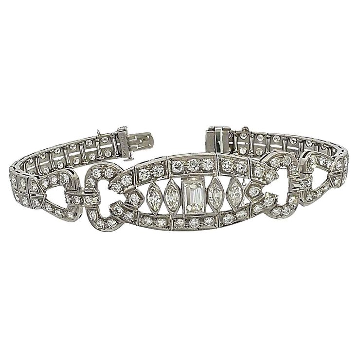 Antique Art Deco Diamond bracelet meticulously crafted with 4.5 to 5 carats of old European, baguette, and marquise-cut diamonds. The double-row diamond line bracelet has a wider central motif of marquise and baguette cut diamonds. The impressive fillagree detail throughout the bracelet creates a timeless elegance and a classic masterpiece. It is expertly crafted to embrace the wrist with a luxurious feel, creating an enchanting adornment that seamlessly fuses comfort with glamour. This antique Bracelet Tennis, Art Deco Bracelet, Marquise Cut Diamond, Baguette Cut Diamond, Art Deco Diamond, Baguette Cut, Antique Art Deco, Baguette Diamond, Marquise Cut