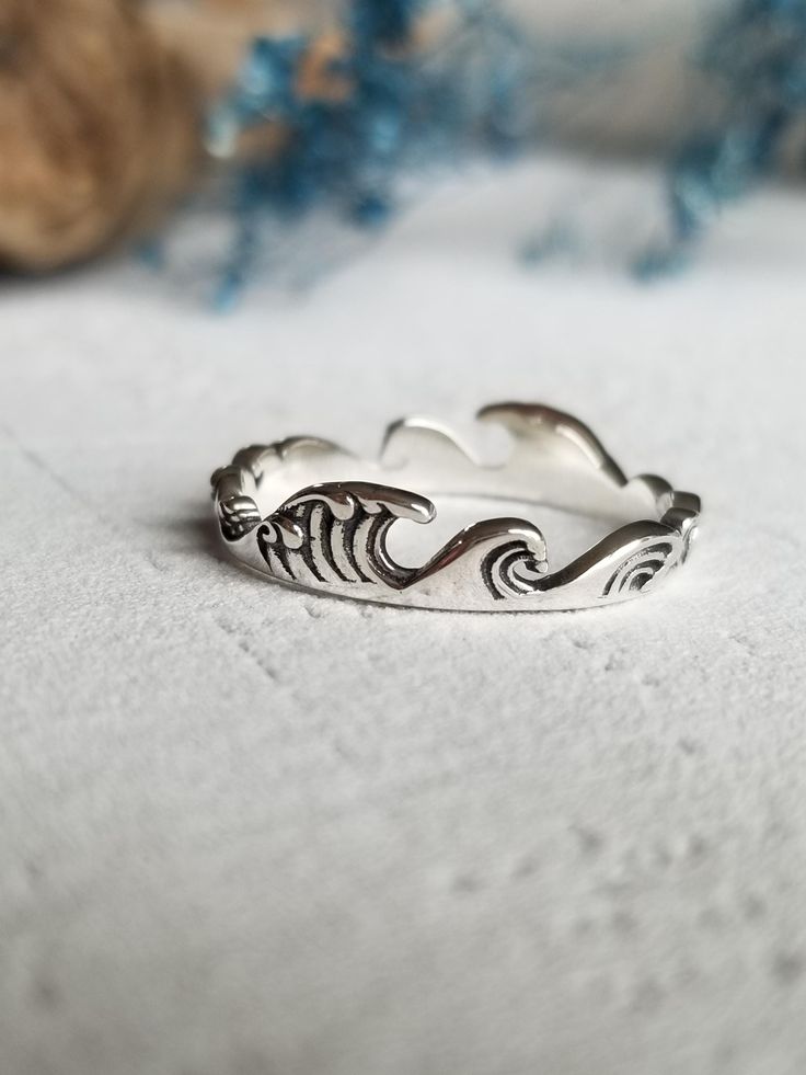 This wave ring is made from 925 sterling silver (hypoallergenic) and is a wonderful gift for ocean lovers!  You can choose your size.  Enjoy free shipping and it will come in a box ready to gift! Adjustable Silver Rings With Ocean-inspired Style, Adjustable Silver Ocean-inspired Rings, Silver Ocean-inspired Jewelry For Promise Ring, Silver Ocean-inspired Promise Ring, Everyday Silver Jewelry With Wavy Design, Everyday Silver Jewelry With Wavy Shape, Everyday Silver Wavy Jewelry, Minimalist Sterling Silver Jewelry For Beach, Adjustable Wavy Sterling Silver Jewelry