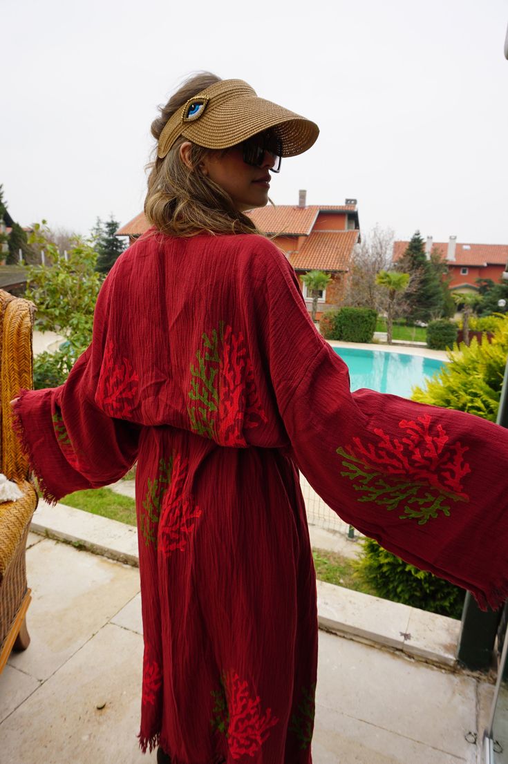 "Beautiful handmade colourful coral red kimono robe, designed with cotton fabric, it flows as you move for a comfortable wear. Beach cover up, a kimono with red coral pattern. This is a lovely, good quality kimono, with traditional breathable kimono sleeves. Belt that ties around the waist. Great to wear around the house, beaches, or to dress up with some jeans & a T-shirt, covering up on the beach with swimsuit. The bird print is really elegant and beautiful. We love kimonos as they are so vers Red Kimono For Beach Cover-up, Red Beachwear Kimono For Festival, Red Kimono For Festival Beachwear, Red Long Sleeve Robe For Summer, Red Long Sleeve Summer Robe, Long Red Summer Robe, Red Bohemian Kimono For Beach Cover-up, Red Bohemian Kimono For Beach, Bohemian Red Kimono For Vacation