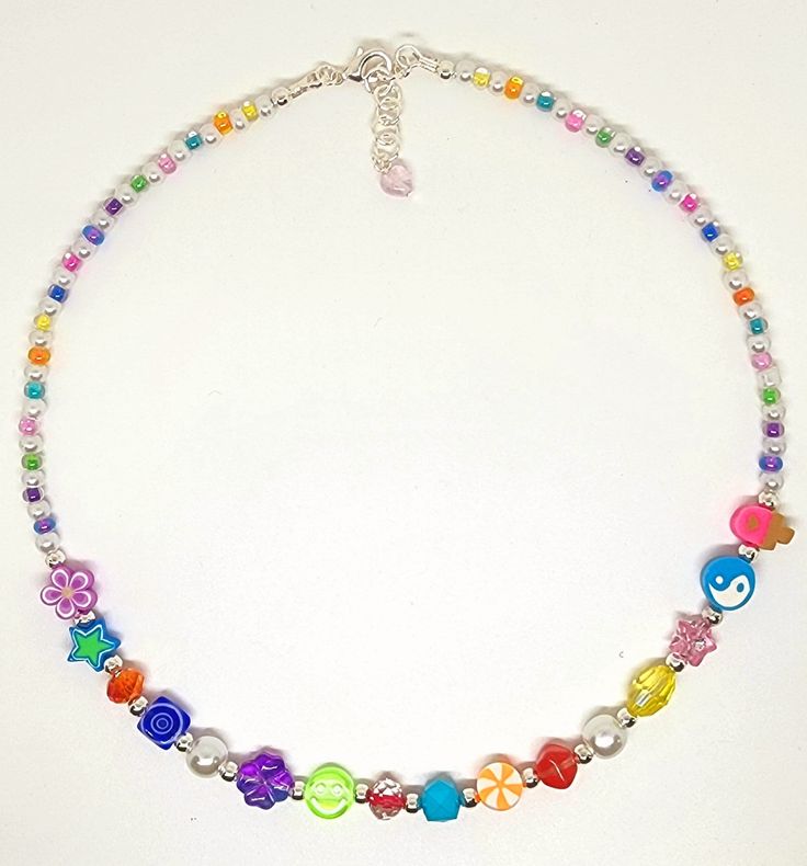 This is a cute 16" extendable to 17" necklace. This piece is lovingly handcrafted with summer in mind and adorned by, freshwater pearls, silicone beads, gold filled accents and a blue crystal heart dangle to finish this piece. Gold Filled Necklace, Glass Heart, Silicone Beads, Glass Crystal, Crystal Heart, Clay Beads, Blue Crystals, Faux Pearl, Favorite Jewelry