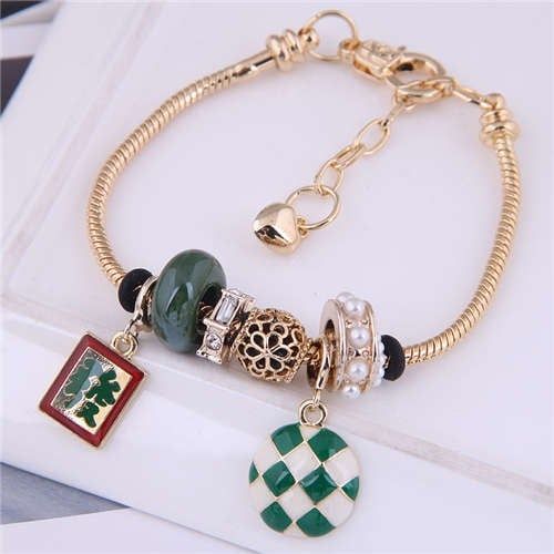 Embrace a unique blend of tradition and contemporary style with our Mahjong & Checkerboard Green Bead Bracelet. This exceptional piece is meticulously crafted from high-quality steel, environmental alloy, and adorned with shimmering rhinestones, offering a sustainable choice for the eco-conscious fashionista. The vibrant green beads are intricately placed to create a playful yet sophisticated checkerboard and Mahjong tile pattern, making this bracelet a striking statement piece. Measuring 17.5*1 Green Alloy Jewelry For Gift, Alloy Bangle As A Gift, Gift Alloy Bangle, Adjustable Alloy Beaded Bracelets, Bohemian Beaded Alloy Jewelry, Adjustable Beaded Alloy Bracelets, Alloy Chain Bracelet, Bohemian Alloy Bangle Jewelry, Alloy Jubilee Bracelet As Gift