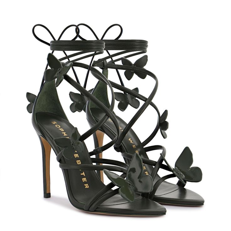 The cool girls wear khaki! Our new hue for 'Vanessa' this season is this season's new neutral. Your go-to khaki green butterfly sandal will make a statement for all the right reasons. This lace-up tie high heel sandal is soon to become your new icon. Chic Green Sandals With 4-inch Heel, Spring Ankle Tie Sandals With 4-inch Heel, Spring Evening Lace-up Sandals With 4-inch Heel, Chic Green High Heel Lace-up Sandals, Green Lace-up Sandals With Wrapped Heel, Formal Spring Lace-up Sandals, Spring Formal Lace-up Sandals, Formal Lace-up Sandals For Spring, Spring Evening Lace-up Open Heel Sandals