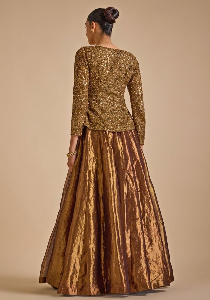 Step into elegance with Gold Embroidered Jacket Set. Crafted from luxurious blended silk, this stunning jacket features intricate zardozi and sequin embroidery detailing that exudes sophistication. The jacket's opulent design is perfectly complemented by a flared skirt, creating a harmonious blend of tradition and contemporary style. A perfect indo western outfit a bride or bride to be for Cocktail parties or Reception Night. Composition : Jacket - Blended Silk, Skirt - Tissue Care: Dry Clean On Cocktail Attire For Women Wedding, Indo Western Outfit, Cocktail Attire For Women, Indian Designs, Traditional Attires, Cocktail Wear, Western Outfit, Vacuum Storage, Embroidery Detailing