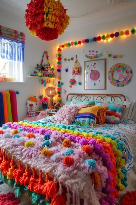 a bedroom decorated in bright colors and lots of pom poms