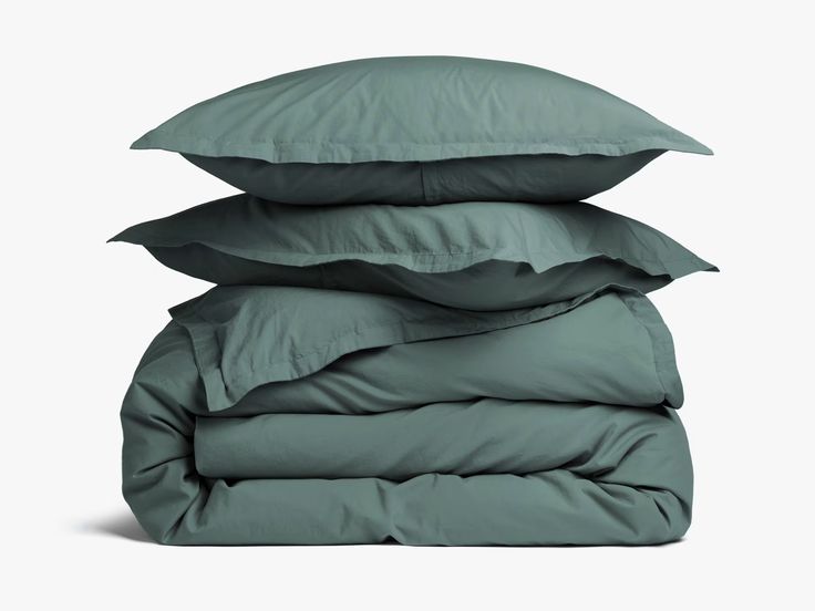 four pillows stacked on top of each other