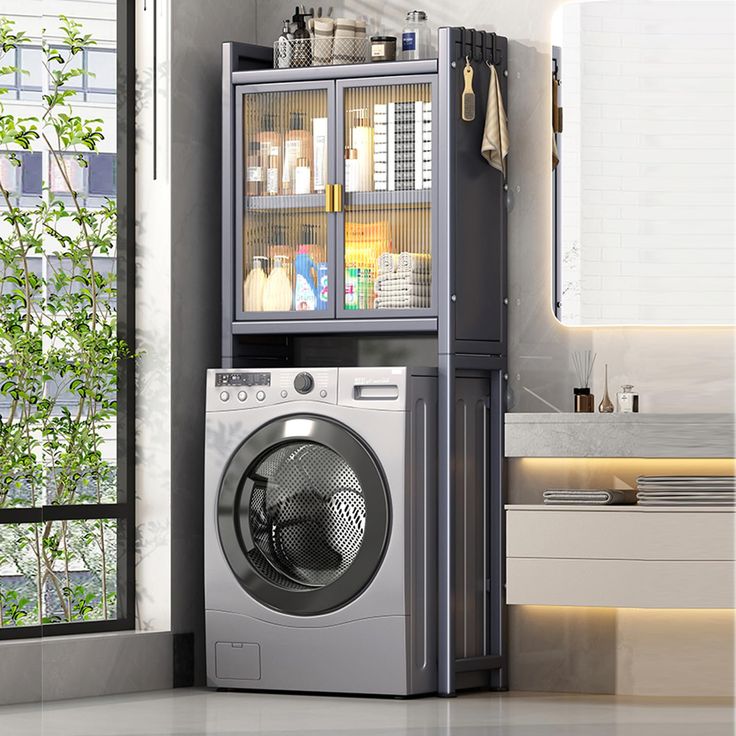 a washer and dryer sitting next to each other in a room