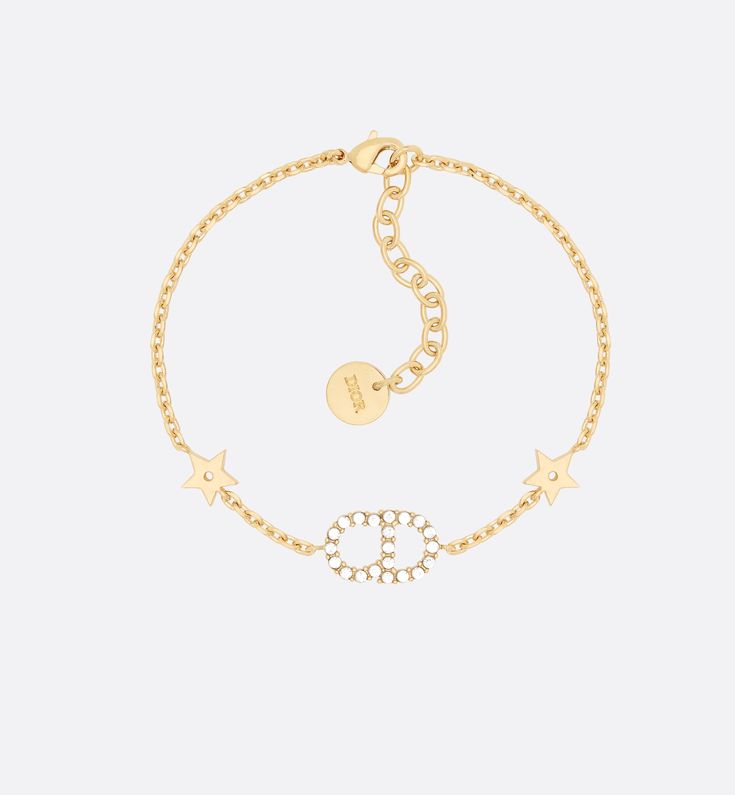 The Clair D Lune bracelet set is both elegant and delicate. The two gold-finish metal chain bracelets are accented with classic House symbols and sparkling crystals. The bracelet set can be worn separately or with other Clair D Lune creations.. Dior Kids, Dior Bracelet, Gold Bracelet Set, Kids Bracelets, Chain Bracelets, White Crystals, Sparkling Crystal, The Two, Metal Chain