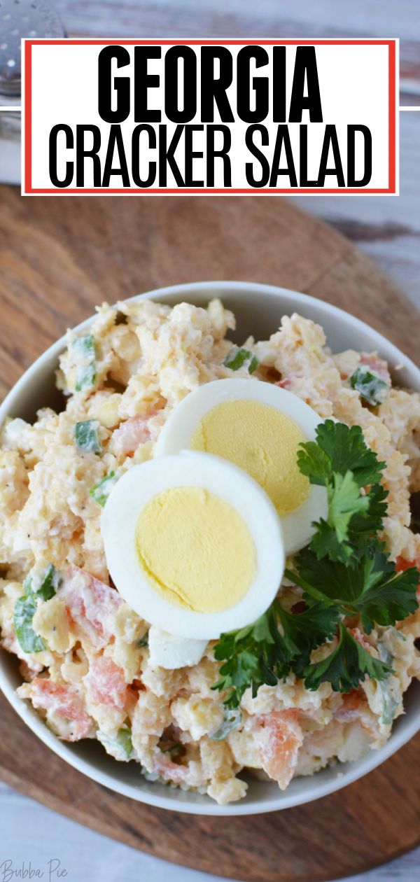 a bowl filled with coleslaw and an egg on top