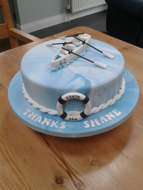 there is a blue cake with white frosting on it that says, thanks stanley