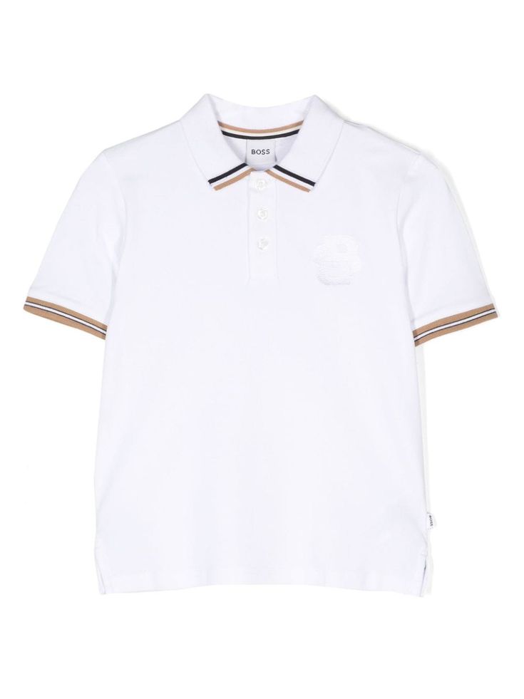 white cotton blend piqué weave embroidered logo at the chest stripe trim polo collar front button placket short sleeves short side slits straight hem White Polo Shirt With Polo Collar For Summer, White Polo Shirt For Summer, White Sporty Polo Shirt With Collared Neckline, Summer Striped Collar Polo Shirt, White Casual Polo Shirt With Striped Collar, Casual White Polo Shirt With Striped Collar, Summer Polo Shirt With Contrast Collar And Short Sleeves, White Collared Polo Shirt With Signature Stripes, White Cotton Polo Shirt With Polo Collar