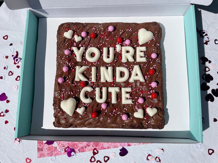 a cake in a box that says you're kinda cute