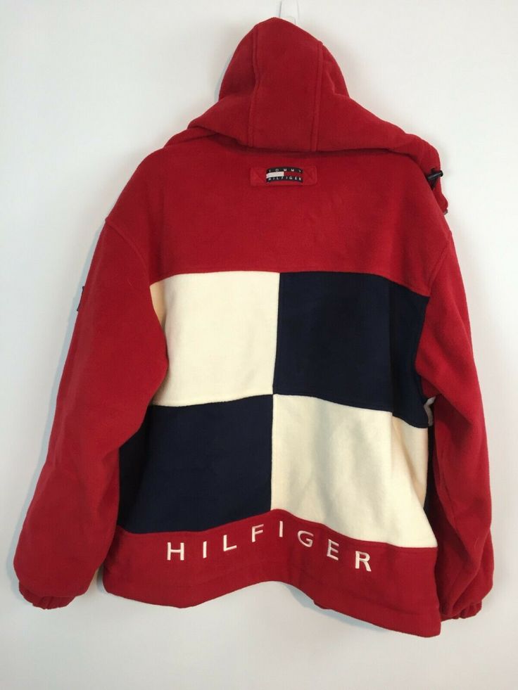 Vintage TOMMY HILFIGER 90s Big Flag Spell Out Hooded Jacket Coat Men's Size Medium.  Full zip with two outer zippered pockets and 1 inner hook and loop pocket.  Fleece with nylon lining.  Drawstring at waist.  This was my daughter's jacket from the 90's.  It's been packed away for around 25 years.  Excellent pre-owned condition.  Free priority shipping - US lower 48 only. Approx. Measurements: Pit to pit (laying flat) - 26" Neck to hem - 28" Shoulder to wrist - 25" Inner sleeve to wrist - 21" Bo Tommy Hilfiger Hooded Streetwear Outerwear, Hooded Tommy Hilfiger Outerwear For Streetwear, Long Sleeve Tommy Hilfiger Outerwear For Streetwear, Tommy Hilfiger Hooded Outerwear For Streetwear, Tommy Hilfiger Long Sleeve Outerwear For Streetwear, Winter Vintage Sweatshirt With Pockets, Tommy Hilfiger Hooded Windbreaker For Winter, Tommy Hilfiger Winter Windbreaker With Pockets, Tommy Hilfiger Hooded Winter Windbreaker