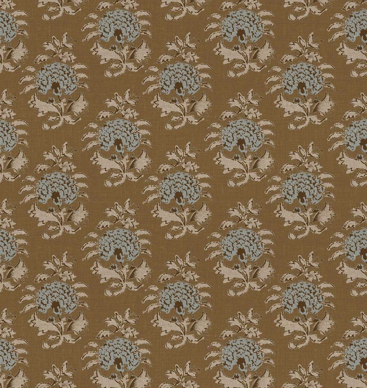 a brown background with blue flowers and leaves