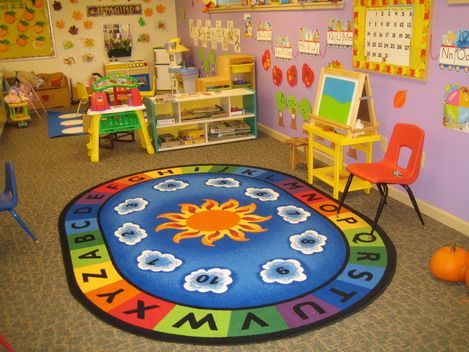 a child's play room with toys and decor