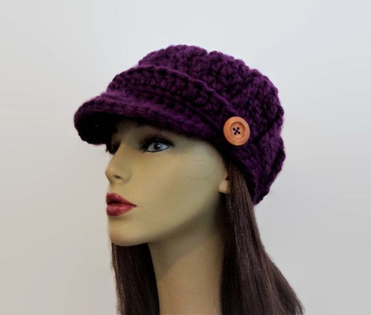 This is made to order. It is crocheted with chunky medium to dark purple acrylic yarn. Buttons will vary depending on availability. Hand wash is recommended. Hand Knitted Purple Crochet Hat One Size Fits Most, Adjustable Hand Knitted Purple Crochet Hat, Adjustable Purple Hand Knitted Crochet Hat, Hand Knitted Purple Crochet Hat One Size, Purple Hand Knitted Crochet Hat, Adjustable Purple Crochet Hat For Winter, Handmade Casual Purple Crochet Hat, Purple Crochet Yarn Hat, Adjustable Purple Yarn Crochet Hat