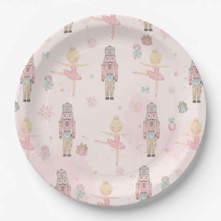 a pink paper plate with nutcrackers on it