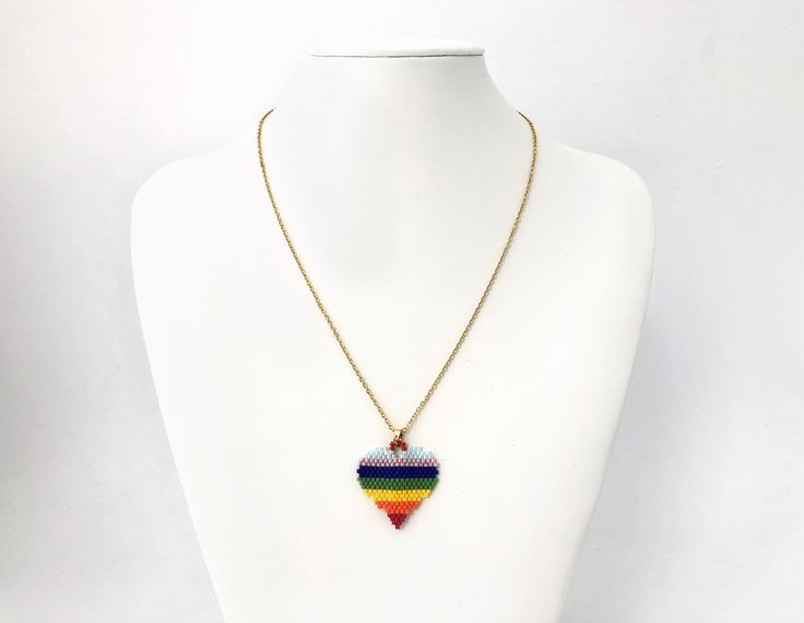 "Handmade Miyuki rainbow heart pendant necklace. * Measurement: Total length approx 45cm including clasp, heart pendant size approx 30x30mm * Materials: Miyuki beads and metal chain * Metal Plating Color: Gold * No return or refund for this \"Made To Order\" item Color may vary depending on monitor settings and lighting ENJOY GREAT SAVINGS ON COMBINED SHIPMENT We welcome any custom-made and wholesale requests!! Go to our homepage to see discounts and coupon offers https://www.etsy.com/hk-en/shop Adjustable Multicolor Heart Charm Necklaces, Heart-shaped Colorful Beads Jewelry For Gifts, Adjustable Heart-shaped Multicolor Necklaces, Multicolor Heart Charm Pendant Necklace, Handmade Rainbow Necklaces For Everyday Wear, Handmade Rainbow Necklaces For Everyday, Adjustable Heart-shaped Multicolor Necklace, Heart Pendant Jewelry With Colorful Beads For Gift, Adjustable Multicolor Heart Necklace