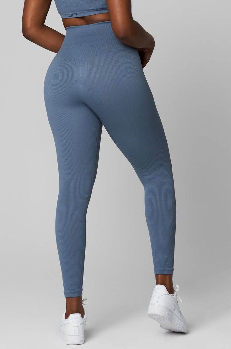 Level up your activewear wardrobe with our Seamless Ribbed full length leggings. Cut to a seamless fit from our high quality baby ribbed fabric with wide waistband, these leggings are designed to make you feel secure and comfortable whether you’re grabbing a coffee to go or hitting the gym floor. Our ribbed leggings are constructed from ultra-soft, premium fabric that are made to last. These high-waisted leggings are the ideal choice for the gym or lounging. Tip: when putting on your leggings, w Seamless Snug Fit Leggings For Gym, Solid Full-length Ribbed Leggings, Solid Full Length Ribbed Leggings, High Stretch Ribbed Elastane Leggings, Full Length Solid Ribbed Leggings, Sporty Snug Fit Seamless Leggings, Ribbed High Stretch Full Length Leggings, High Stretch Ribbed Full-length Leggings, Full Length High Stretch Ribbed Leggings