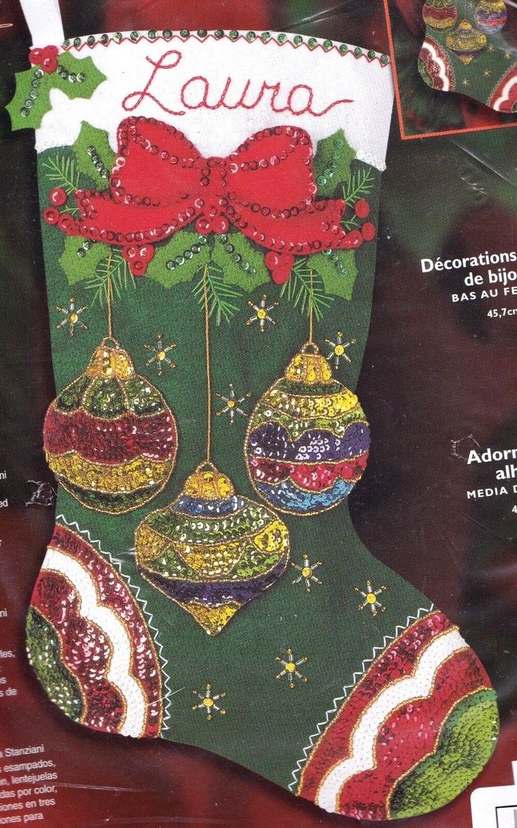 a christmas stocking with ornaments and bows on it's side is featured in this ad