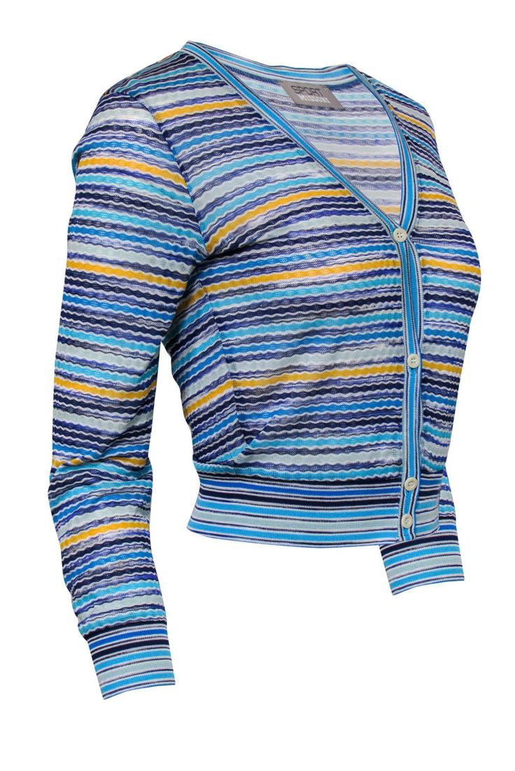 Go chic in chevron with this cardigan from Sport Missoni! Made in the iconic Italian fashion house's famous chevron knit, this cropped sweater is the perfect layering piece for those spring days when it's just a tad chilly. Throw on over a tee and jeans for a cute and casual look you can rock any day of the week. Size 8 (IT 44) 63% Cotton, 37% Viscose Front button-up closure Cropped silhouette V-neckline Chevron print design Bust 35" Waist 32" Sleeve length 21" Shoulder to hem 19.5" Spring Striped Sweater With Button Closure, Yellow Chevron, Sport Sweater, Chevron Print, Day Of The Week, Italian Fashion, Layering Pieces, Missoni, Cropped Sweater