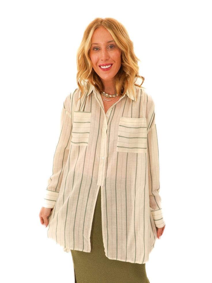 Lightweight and the cutest swim cover or paired with denim and front tuck would be the ultimate comfortable look. - Oversized tunic - Ivory and green striped top - Chest pockets - Button downs top half - Splits open below buttons in the front - Gathered in the back - 65% Rayon // 35% Polyester - Color may vary due to lighting on image Meet Klarisa // Wearing Size Small Height // 5’6 Bust // 32” Waist // 27” Bottom Workout, Front Tuck, Striped Tunic, Oversized Tunic, Jumpsuit Jacket, Sweater Tank Top, Women Long Sleeve Tops, Swim Cover, Dress Romper