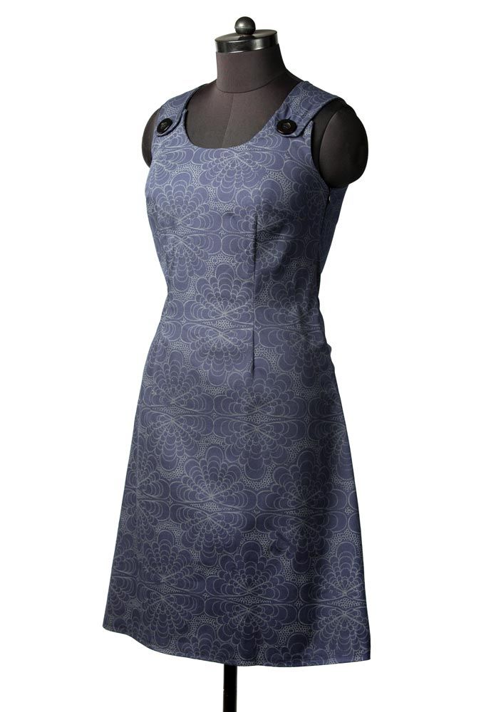 a mannequin wearing a blue dress with flowers on it