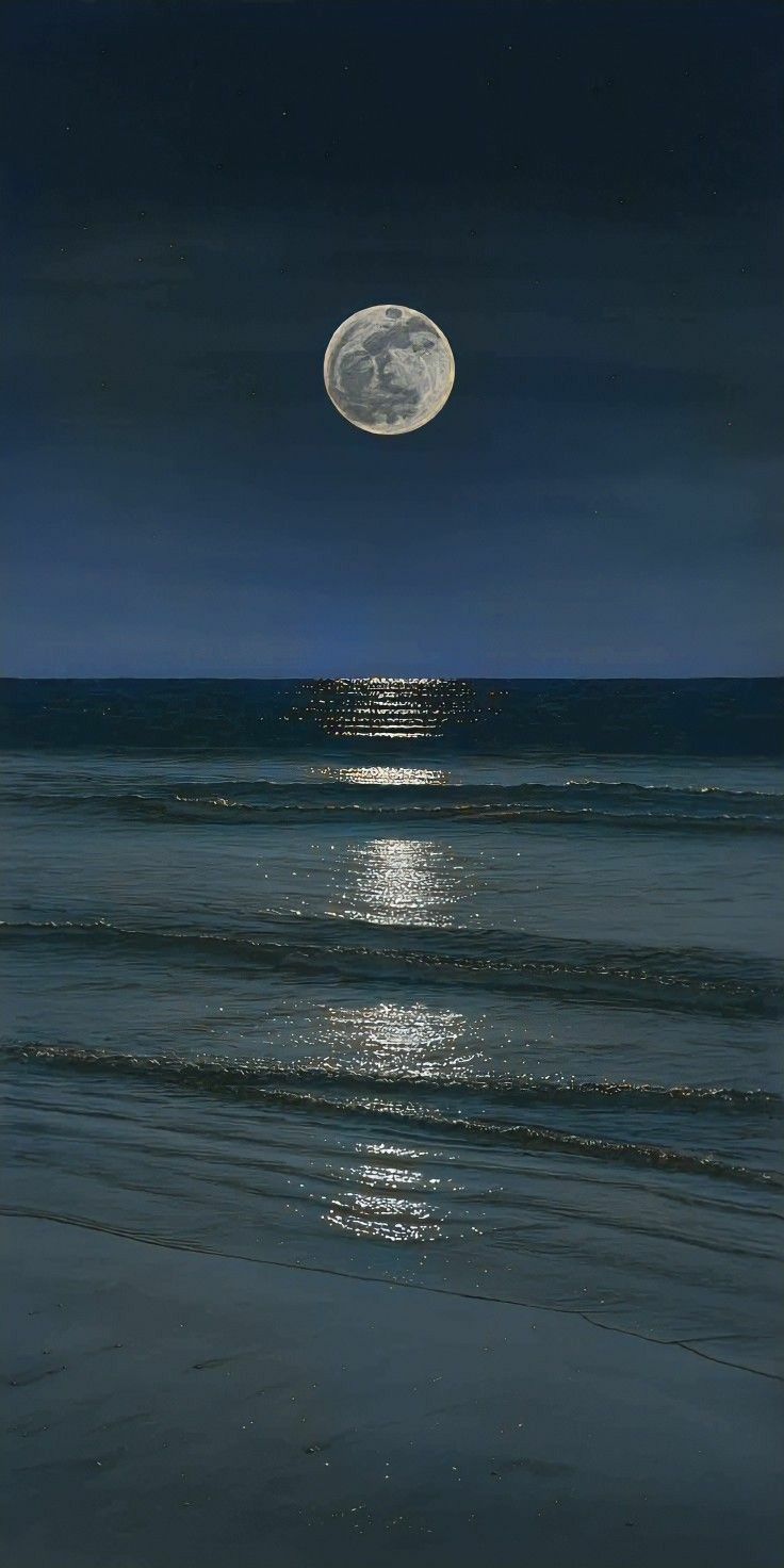 the full moon shines brightly over the ocean