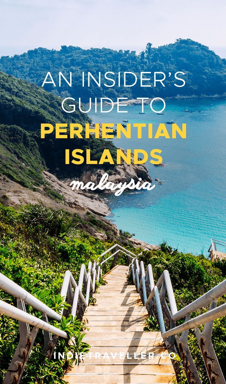 stairs leading down to the ocean with text overlay that reads an insider's guide to perhentian islands