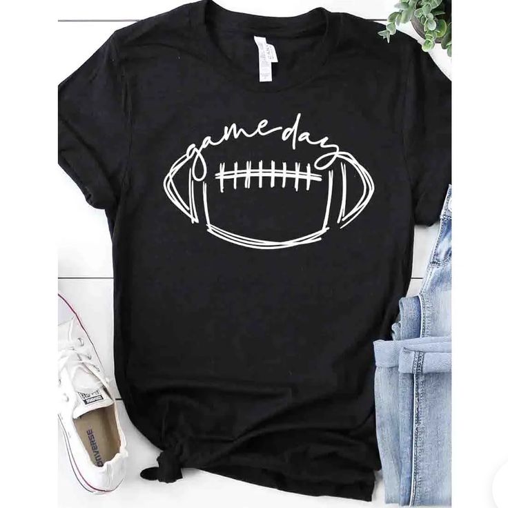 Cursive Football Game Day Tee Black T-shirt With Football Season Text Print, Black T-shirt With Text Print For Football Season, Black Graphic Print Top For Football Season, Black T-shirt For Game Day In Fall, Black T-shirt For Fall Game Day, Black Tops With Text Print For Football Season, Black T-shirt For Game Day Football Season, Black Tops For Game Day During Football Season, Trendy Black Tops For Game Day