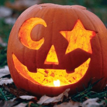 a pumpkin carved to look like a jack o lantern