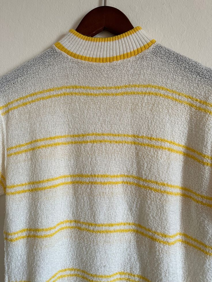 "Vintage striped mock neck sweater short sleeve 60s mod atomic 1960s yellow stripe knit shirt unisex 70s rude boy 1970s vtg Kurt Cobain Sweater  >> Please double check your measurements & compare to these listed below, for accurate sizing. Vintage often runs small, so don't rely on the tag size.  Tag reads: ILGWU UNION MADE  Measurements taken flat/unstretched : *Chest Width, armpit to armpit: approx 22\" (44\" chest)  *Length, from top of shoulder/collar seam: approx 23\"   >> In great vintage Retro Ribbed Striped Tops, Retro Striped Ribbed Tops, Winter Knit Tops With Contrast Stripes, Winter Knit Top With Contrast Stripes, Cotton Sweater With Contrast Stripes In Relaxed Fit, Relaxed Fit Sweater With Contrast Stripes For Spring, Spring Contrast Stripes Relaxed Fit Sweater, Spring Relaxed Fit Contrast Stripes Sweater, Spring Contrast Stripes Relaxed Sweater