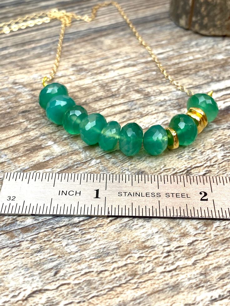 Gold filled Necklace with Emerald green onyx gemstones beads, love gift, Valentine's Day gift, mom gift, birthday gift * Gold filled chain: small oval links made from flattened wire shine as they catch the light. * 8mm Natural Emerald green onyx ( light- medium color ) Emerald green onyx is the birthstone of May. the symbol of love, hope and harmony Beautiful rich color. Great price!! Beautiful quality My jewelry will be wrapped in a beautiful gift box ready to gift. Please visitor my entire sto Green Beaded Emerald Necklace For May Birthstone, Gold Emerald Necklace With Polished Beads As Gift, Gold Emerald Necklace For Jewelry Making, May Birthstone, Gift Polished Beads Emerald Necklace, Handmade Emerald Necklace, May Birthstone Gift, Gold Filled Necklace, May Birthstone, Green Onyx, Natural Emerald