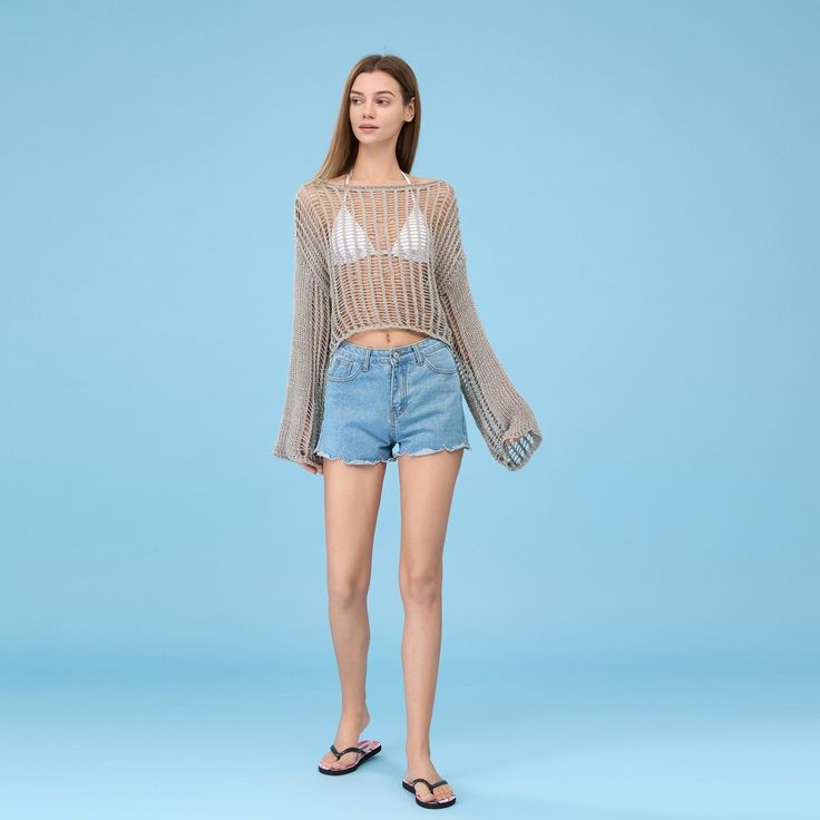 We got your new favorite cover-up top for the summer babe! It’s crafted from a crochet knit and features a round neckline, sheer construction, and dropped-long sleeves. The Sheer style design adds a touch of femininity, while the relaxed fit ensures a flattering silhouette. So whether you're lounging by the pool or taking a stroll along the shore, this cover-up dress has got you covered! Product Code: CAA07A3A003HH/CAA07A3A003AA/CAA07A3A003CC/CAA07A3A003DD/CAA07A3A003PP Model Wearing Size: S Hei Sheer Mesh Top For Beach In Summer, Sheer Tops For Beach Season, Beachy Open Knit Top For Summer, Spring Open Knit Crochet Top For Beachwear, Summer Knit Crop Top With Crew Neck, Sheer Mesh Top For Beach Summer, Spring Beach Crop Top With Crew Neck, Sheer Tops For Beach Season Vacation, Sheer Summer Top For Beach