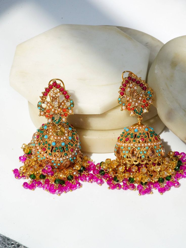 Aamina Matte Gold Plated Multicolor Jhumkas - Navratan Indian jewelry Multicolor Temple Jewelry Jhumkas For Festivals, Elegant Multicolor Jhumkas For Festive Occasions, Elegant Multicolor Jhumkas For Celebration, Fusion Style Chandbalis With Latkans For Celebration, Fusion Hoop Earrings With Latkans For Celebration, Gold Fusion Hoop Earrings With Latkans, Multicolor Temple Jewelry Jhumkas For Celebration, Multicolor Gold Plated Fusion Jewelry, Elegant Multicolor Kundan Jhumkas