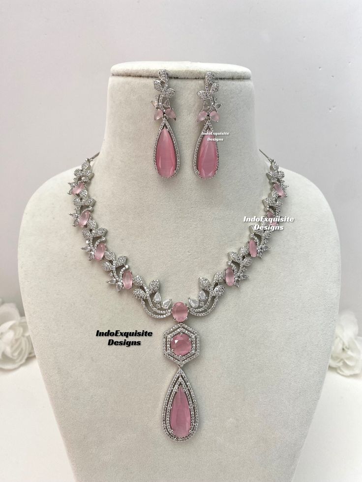 American Diamond Necklace Set/CZ Necklace/ Reception Jewelry/Silver pink   All items are shipped from Brampton, Ontario, Canada. If you need your item by a certain day, please reach out to us for express delivery option so that we can update shipping for you before you place the order.  Standard shipping/delivery timeline Below are the delivery timeline estimates. We dispatch all orders by the next business day. ---> USA delivery timeline * 3-6 business days to major urban centers in USA. It may American Diamond Necklace Set, Brampton Ontario, American Diamond Necklaces, Diamond Necklace Set, Bollywood Jewelry, Cz Necklace, American Diamond, Buy Handmade, Jewelry Silver