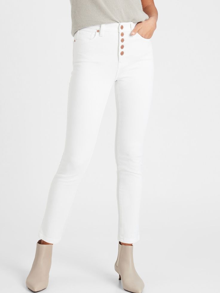 SLIM FIT: Our version of the cigarette jean, these have a skinny fit from hip to knee, and a slim leg that’s a little wider than a skinny leg.  4-WAY STRETCH: Advanced bi-stretch denim, engineered with 4-way stretch for a holds-you-in feeling that' Tight Straight Leg Jeans For Spring, Trendy Tight Straight Leg Jeans, White Fitted Straight Jeans, White High Rise Stretch Cropped Jeans, White Stretch High Rise Cropped Jeans, Slim Fit Straight Leg Jeggings, White High Rise Fitted Cropped Jeans, White Fitted High Rise Cropped Jeans, Casual Slim Fit Straight Leg Jeggings