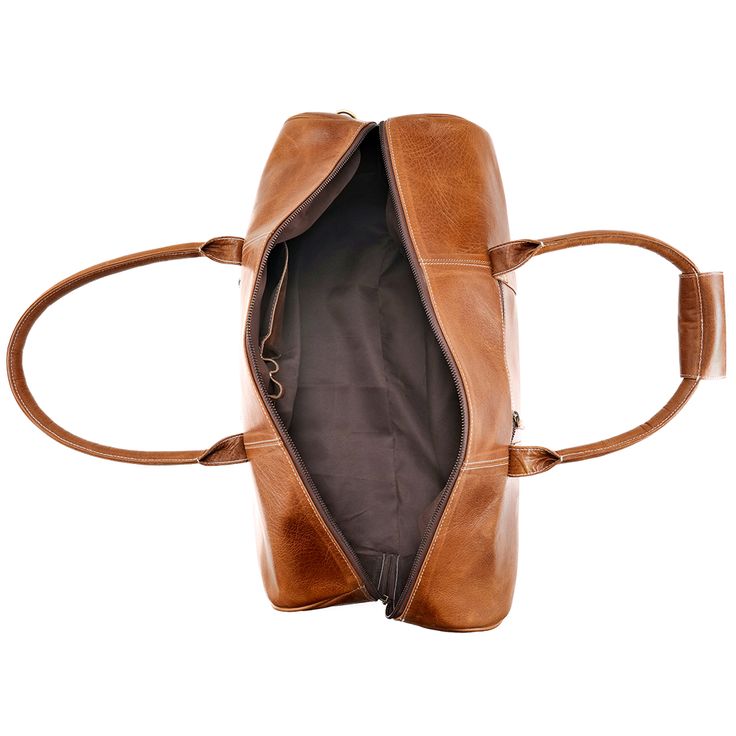 Handcrafted from The Highest Grade Leather Out There OUR FULL GRAIN LEATHER DUFFLE BAG IS BUILT TO LAST A LIFETIME. By placing your trust in a bag made from full grain buffalo leather you're investing in only the very top hide of the toughest stuff out there: buffalo leather. No chemical processes are permitted and it's notoriously difficult to work with. But the rewards of this hard work will be seen by your friends and family for decades to come as the patina and character of your full grain l Cognac Textured Leather Bag For On-the-go, Classic Textured Faux Leather Bag, Vegetable Tanned Leather Bag For On-the-go, Brown Leather Shoulder Bag With Smooth Grain, Daily Use Leather-lined Rectangular Duffle Bag, Textured Leather Bags For Daily Use, Cognac Leather Backpack With Leather Lining For Everyday Use, Soft Leather Brown Shoulder Bag, Brown Soft Leather Shoulder Bag