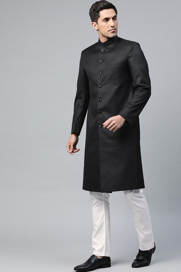 Product Features: Top Color: Black Bottom Color: White Work: Solid Top Fabric: Suiting Teri Cort Bottom Fabric: Art Silk Pack Of: 1 Sherwani and 1 Pant Occasion: Partywear Disclaimer: There will be slight difference in digital to actual image Festive Black Semi-stitched Bandhgala, Black Kurta For Wedding And Festivals, Black Bollywood Nehru Jacket For Wedding, Black Semi-stitched Long Sleeve Bandhgala, Black Kurta For Wedding And Diwali, Formal Black Set With Dabka Detailing, Black Sherwani For Diwali Party, Black Semi-stitched Elegant Sherwani, Formal Black Sets With Dabka Detailing