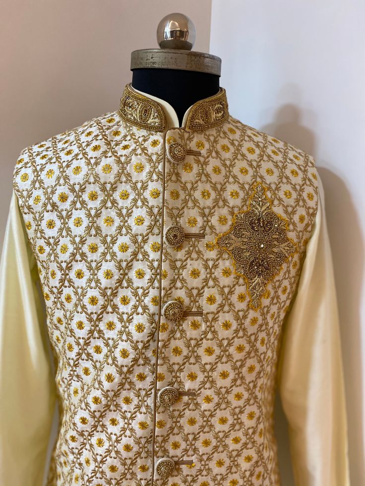 Beige rawsilk Nehru Jacket with Resham and Zari embroidery and pearl highlights. Includes- Nehru jacket with raw silk kurta set. Colour and customisation options available for kurtas set and Nehru jacket . Any queries plz msg us. Elegant Naqshi Choli For Festive Occasions, Traditional Bandhgala For Reception During Diwali, Raw Silk Unstitched Suit With Dabka For Reception, Traditional Naqshi Choli For Eid, Festive Traditional Naqshi Choli, Traditional Eid Choli With Naqshi Details, Bollywood Style Choli With Naqshi For Eid, Elegant Raw Silk Nehru Jacket For Reception, Bollywood Style Embroidered Wedding Suits