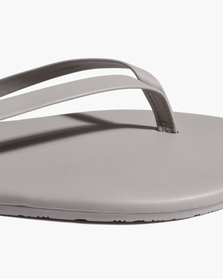 Tonal from strap to sole. A light matte finish on the style that started it all. Handcrafted from soft Brazilian leather in a classic flip flop silhouette. Throw on and go — we added a cushioned insole and rubber outsole for extra comfort. Everyday Open Toe Rubber Sole Flip Flops, Everyday Open Toe Flip Flops With Rubber Sole, Cushioned Single Toe Strap Flip Flops, Classic Everyday Flip Flops With Single Toe Strap, Adjustable Single Toe Strap Flip Flops For Everyday Use, Everyday Toe Post Sandals With Cushioned Footbed, Cushioned Synthetic Flip Flops For Everyday, Classic Adjustable Synthetic Flip Flops, Everyday Open Toe Synthetic Flip Flops