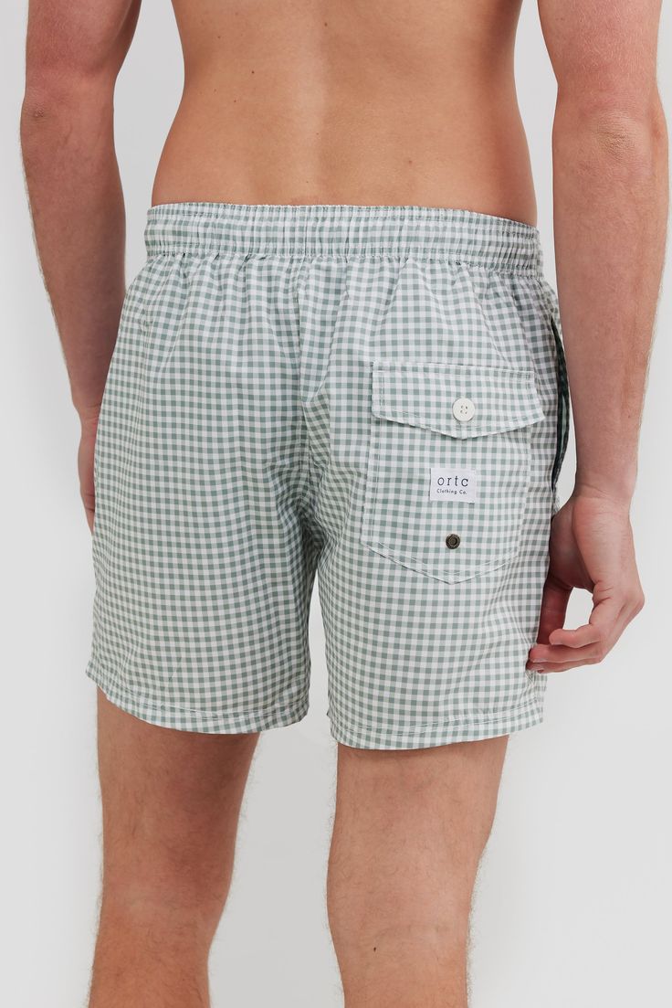 The Horrocks Sage Swim Shorts are the perfect addition to your summer wardrobe. Made from 100% Recycled Polyester, these mid-length shorts are quick-drying and lightweight. An elastic waistband with a drawstring provides an adjustable fit, while internal fine mesh briefs provide extra comfort. Pair with one of our T-shirts to make the perfect summer look. Quick drying, mid-length swim shorts 100% Recycled Polyester Internal fine mesh briefs Elastic waistband with drawstring Two side pockets with rear button up pocket Designed in Australia. Made in China Casual Blue Swim Shorts With Relaxed Fit, Summer Vacation Swim Trunks Short Leg, Summer Vacation Swim Trunks With Short Legs, Relaxed Fit Swim Trunks For Outdoor, Beachwear Bottoms For Outdoor, Stretch Summer Shorts For Outdoor, Summer Stretch Shorts For Outdoor, Summer Outdoor Shorts, Spring Outdoor Swim Trunks With Built-in Shorts