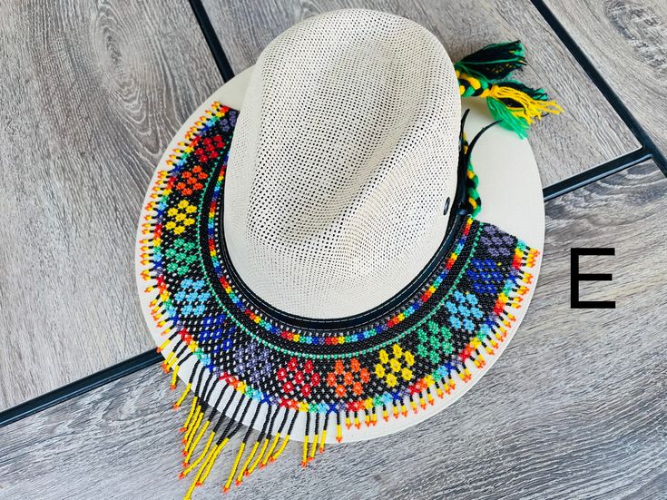 Mexican Beaded hat band. Handmade Huichol hat band. Made with glass Chaquira beads. This listing is for the hat band only. Hat is not included. 📱Please feel free to message me with any questions you may have. 📷Additional photos can be provided upon request. 🛍More colors and sizes in our Etsy shop: https://www.etsy.com/shop/mexitlii 🇲🇽Hablamos Español. Mexican Sunflower, Fiesta Dress, Beaded Hat, Huichol Art, Mexican Dresses, Embroidery Blouse, Hat Band, Cowboy Hats, Lace Trim